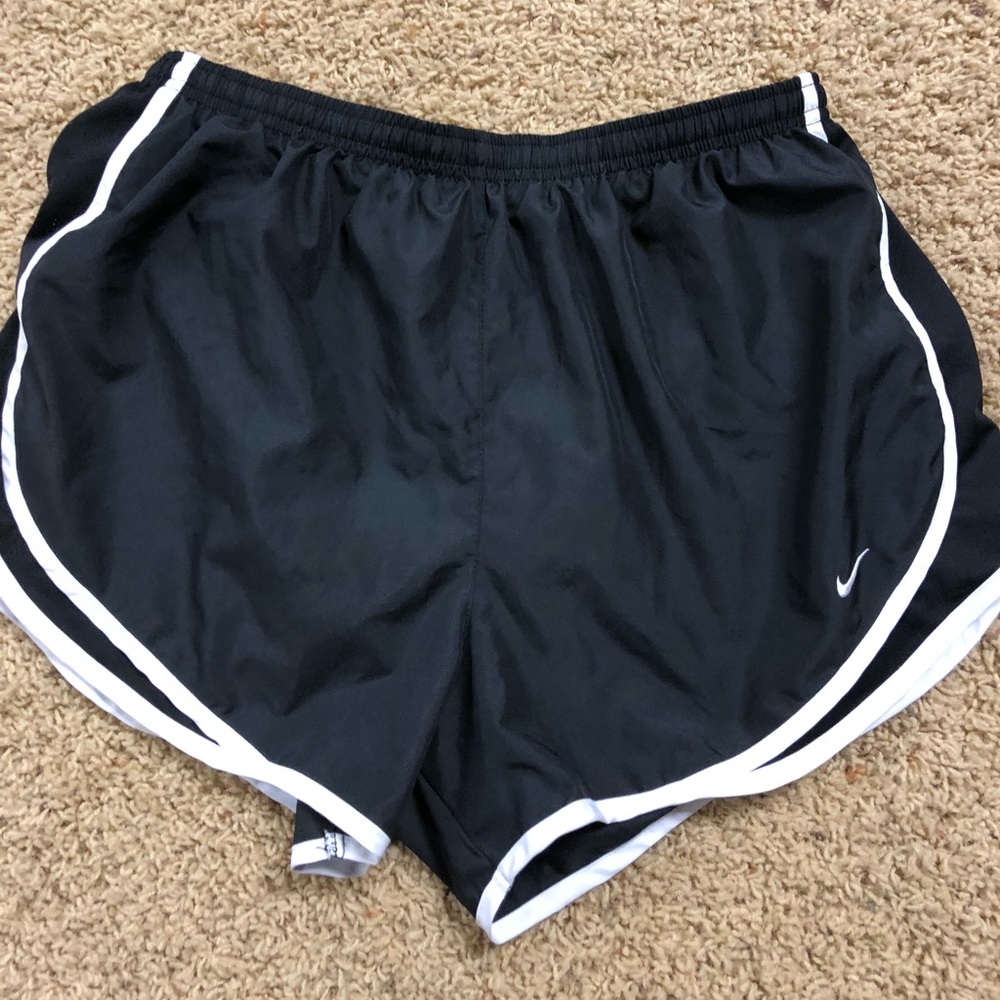 Black and white Nike running shorts